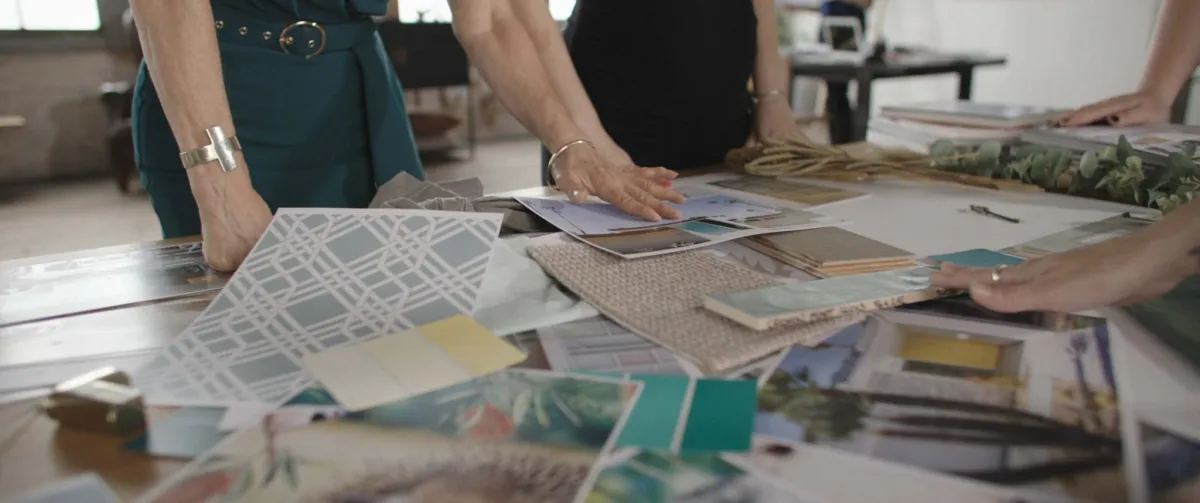 woman looking at fabric samples