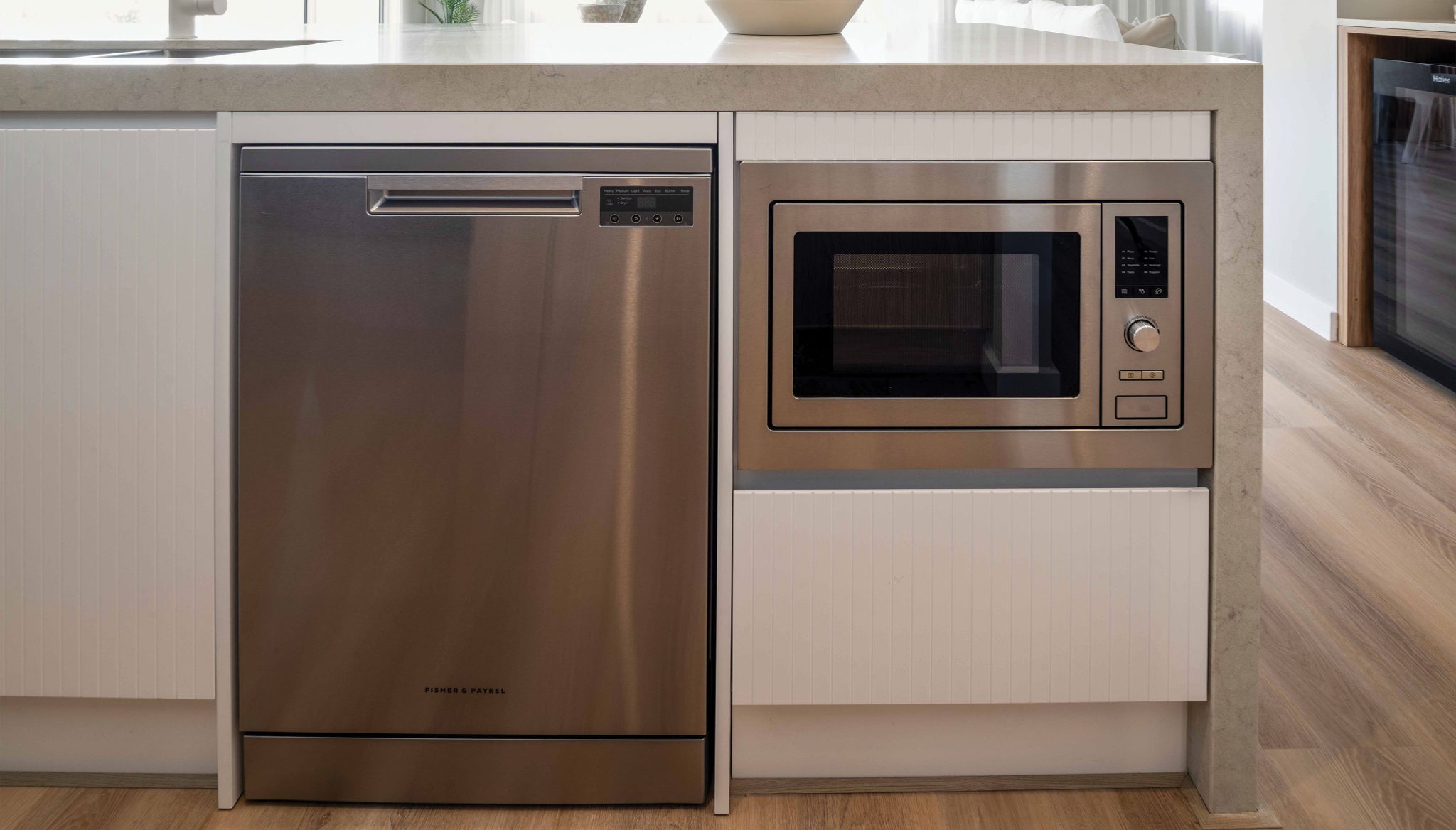 Kitchen: Fisher & Paykel dishwasher and microwave